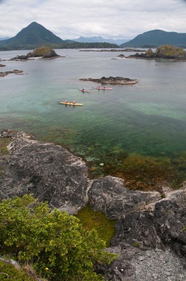 image by Bruce Kirkby kayaking in the Minx Rocks area, Kyuquot, BC