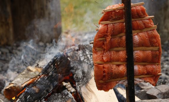 salmon cooking by fire 