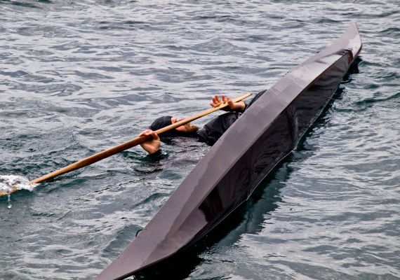 James Manke demonstrating a Greenland kayak roll